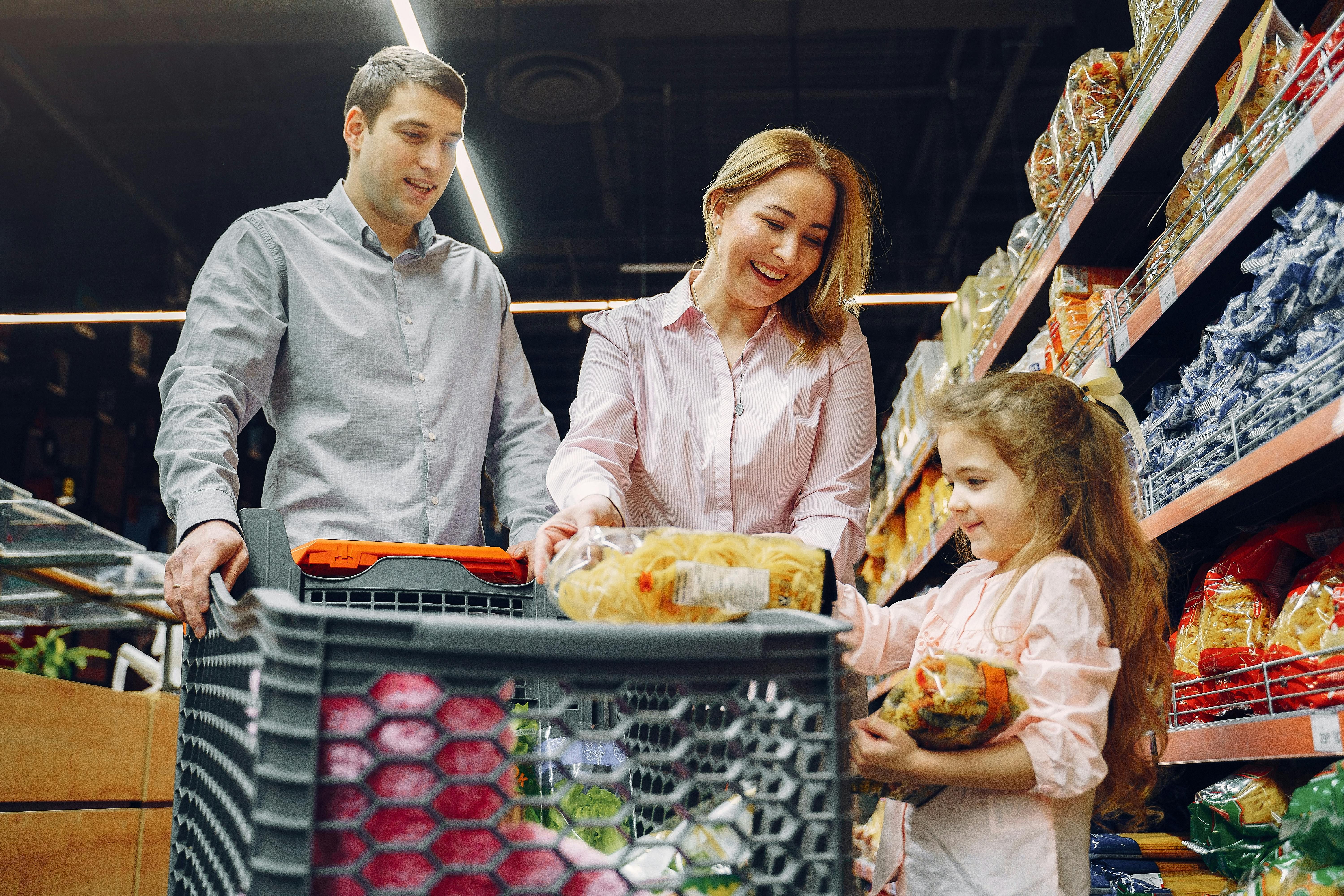 A family shopping for healthy food, choosing fresh produce and [whole grains](/blog/anti-inflammatory-foods) to support their brain and overall wellness.