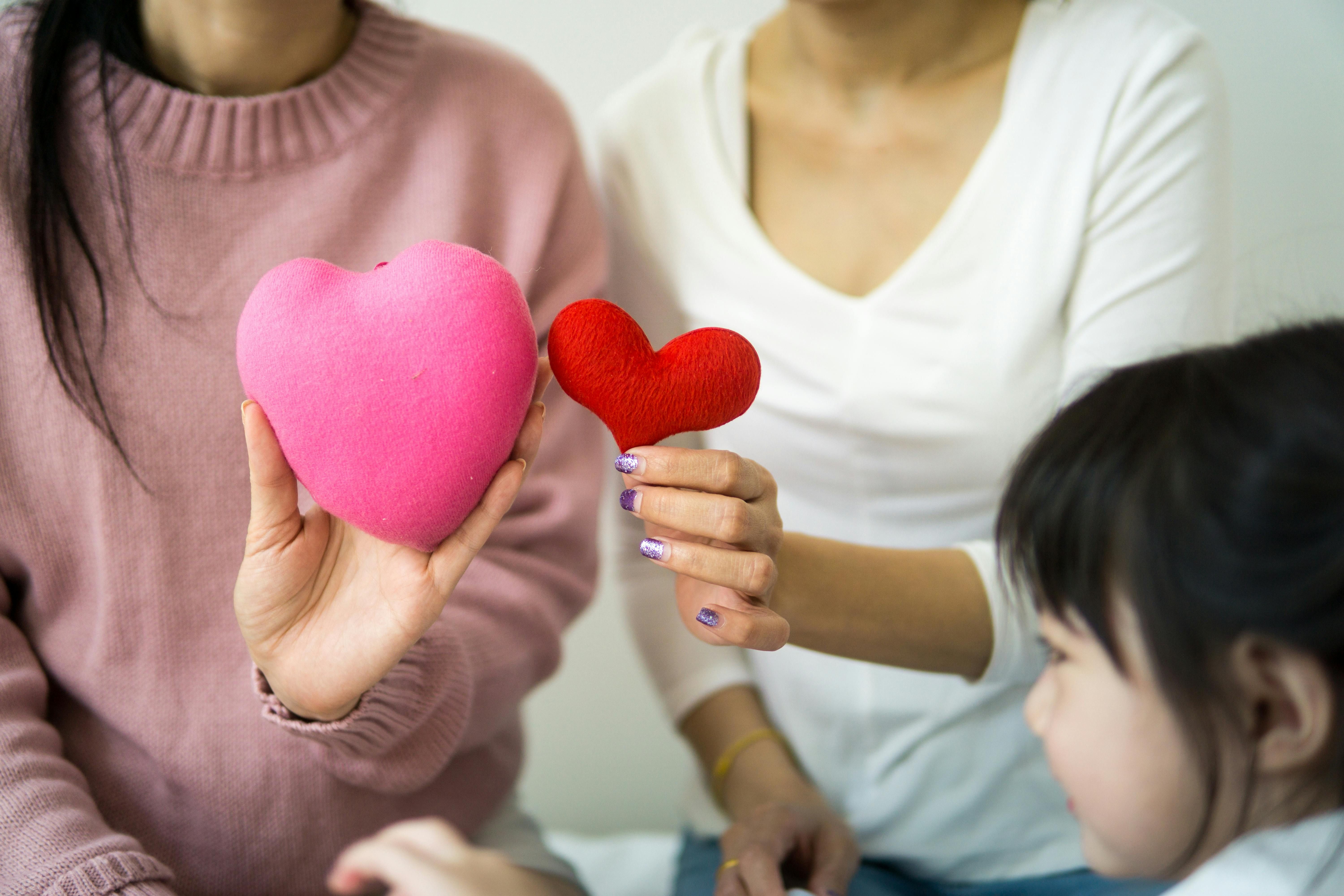 Red heart shapes representing [heart health](/the-secrets-of-longevity-diet-supplements-and-strategies-for-a-longer-life) and cholesterol management