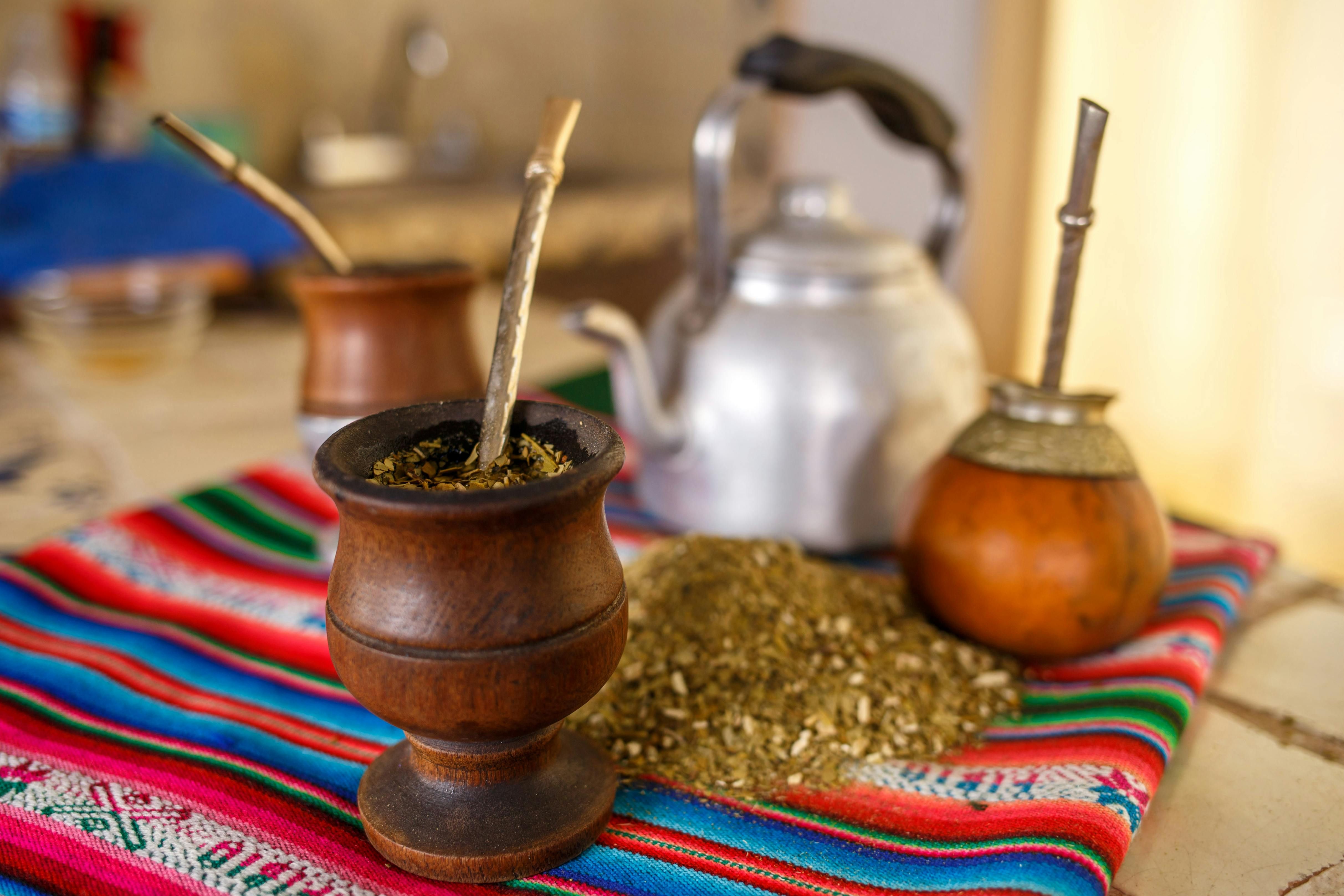 A traditional yerba mate drink served in a gourd, offering antioxidant-rich benefits and boosting energy for overall wellness.