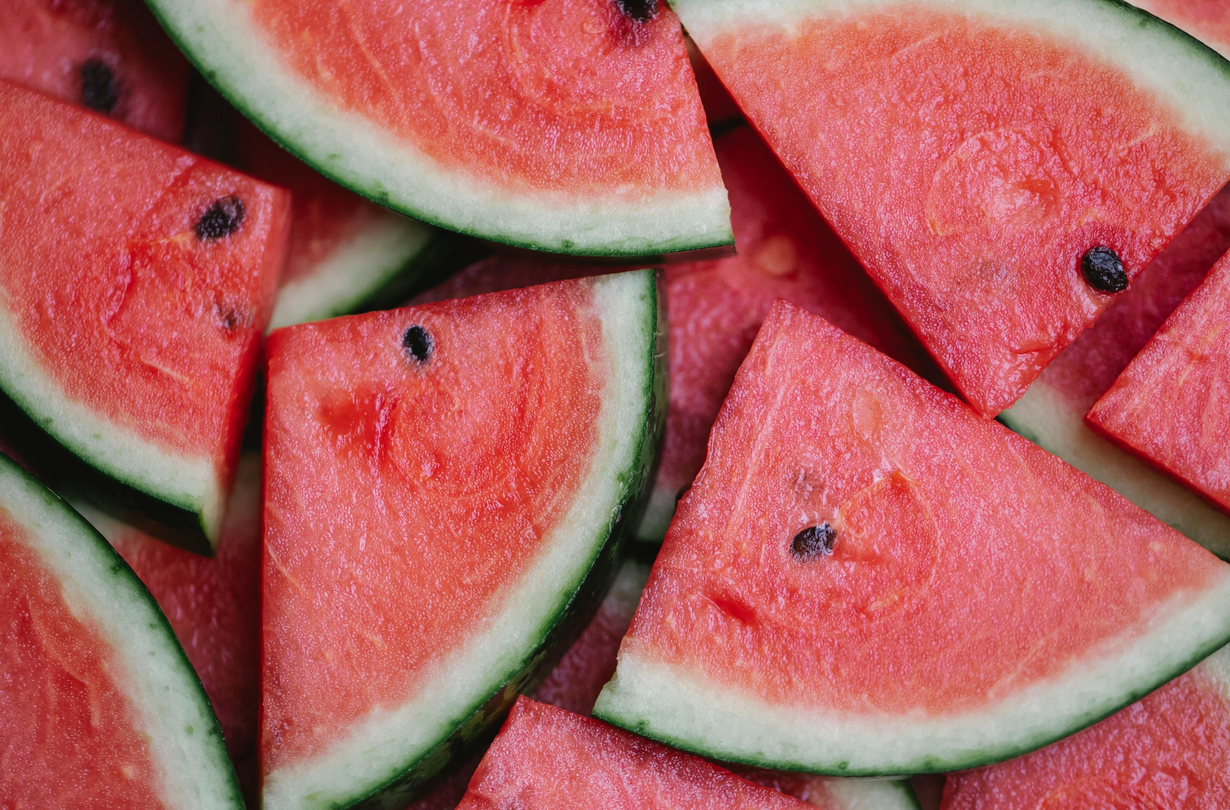 Fresh watermelon slices ready for infused water, offering hydrating and refreshing sweetness with natural antioxidants.